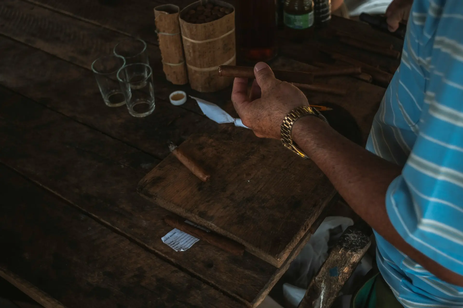 person wearing silver link bracelet watch